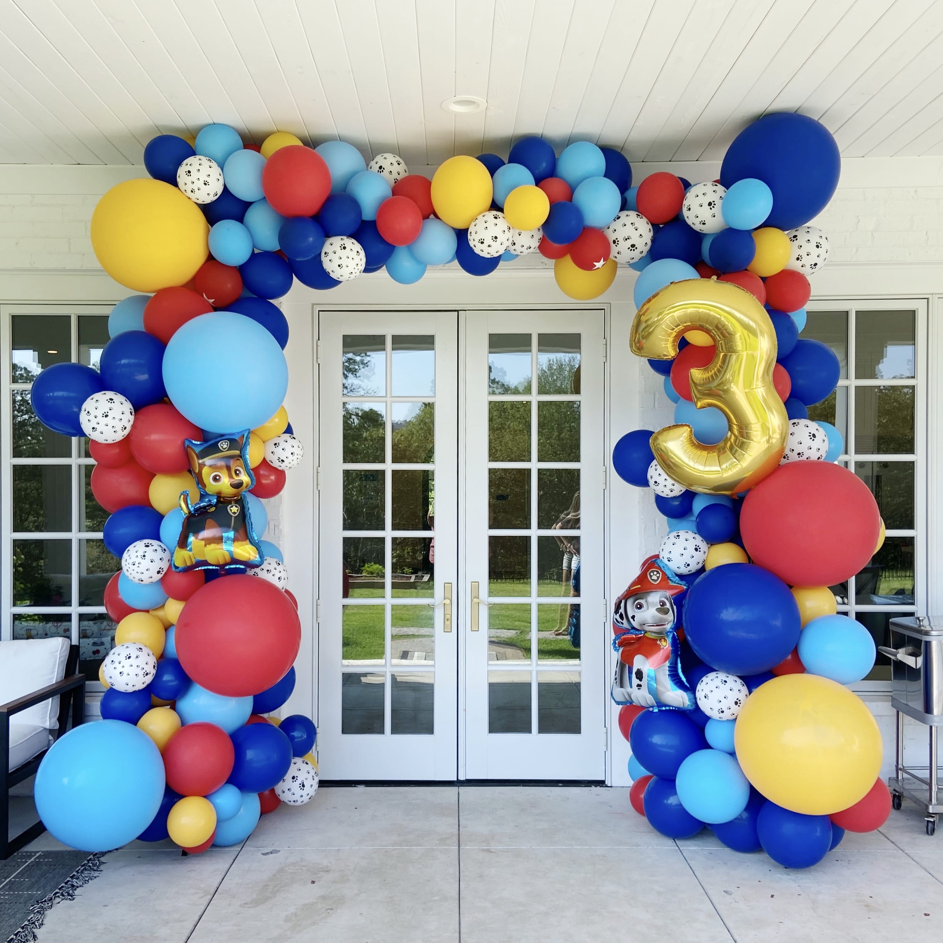 Entryway full balloon arch wrap in Paw Patrol theme by Just Peachy in Little Rock, Arkansas.