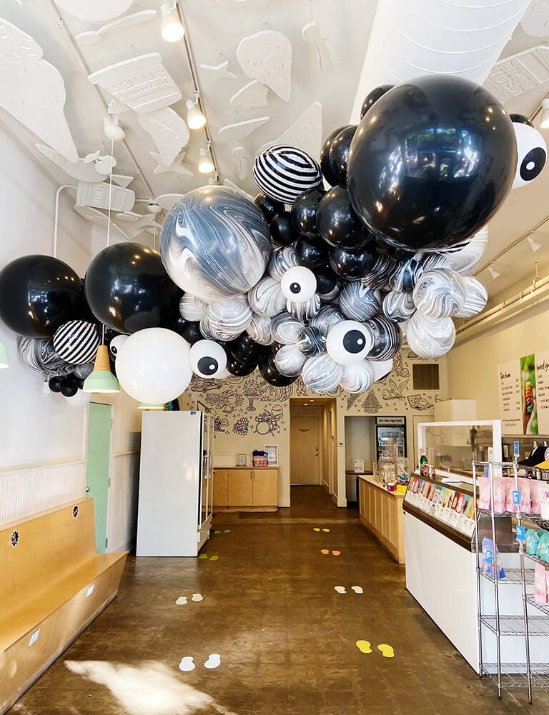 Spooky Halloween balloons on the ceiling of Loblolly in Little Rock, Arkansas.