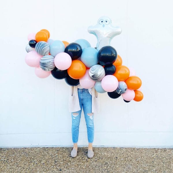 Pink, orange, black, and agate balloons make up this Halloween Grab and Go Garland from Just Peachy in Little Rock.