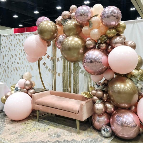 Pink settee rental couch from Just Peachy at the Little Rock Bridal Show.