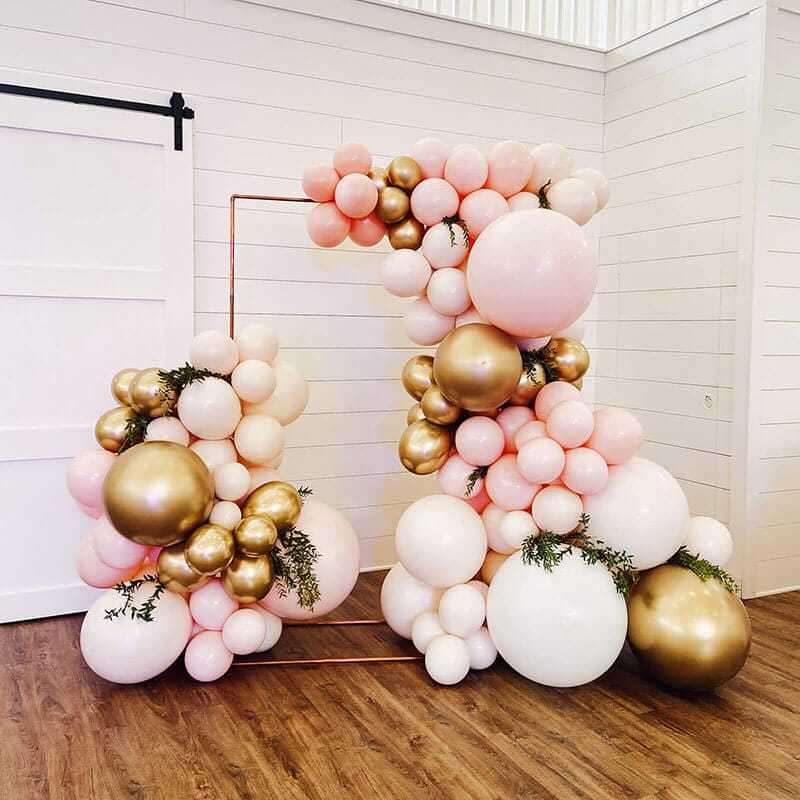 Just Peachy rents backdrops, like this large rectangle copper stand with balloons, for weddings, anniversaries and parties in central Arkansas.