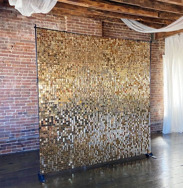 Gold sequin shimmer backdrop for events; available to rent from Just Peachy.