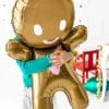 Giant huggable gingerbread man foil helium balloon available at Just Peachy in Arkansas.