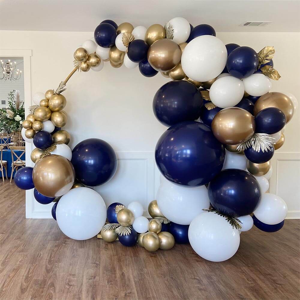Round Gold Arch rental with navy, gold, and white balloons available from Just Peachy in Little Rock.