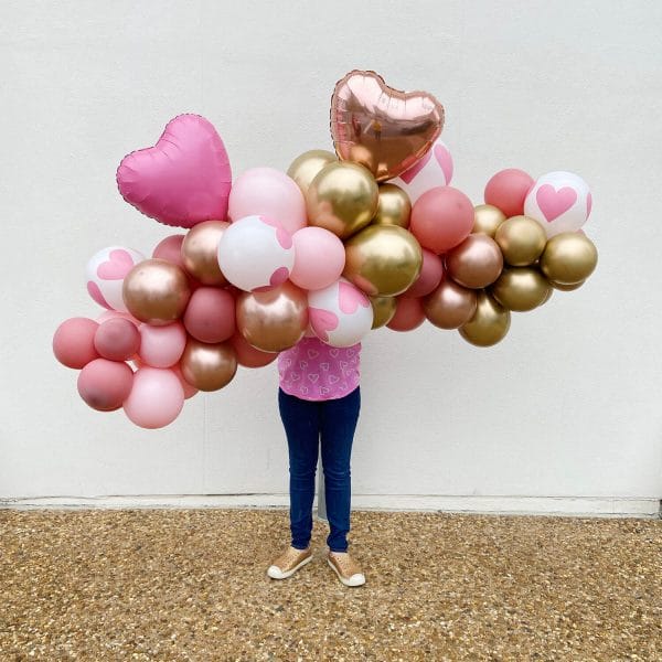 Pink, rosewood, gold, and pink heart balloons for Valentine’s Day from Just Peachy.
