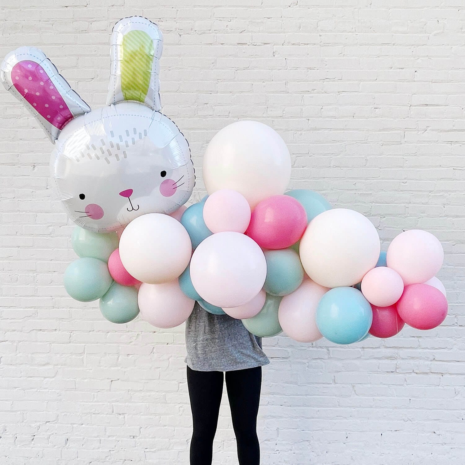 Pink, mint green, and blue pastel balloons in a Grab & Go Garland for Easter from Just Peachy.