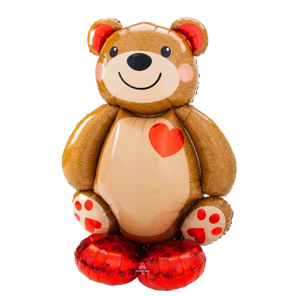 Four foot tall teddy bear mylar inflatable standing balloon with a red heart available from Just Peachy in central Arkansas.