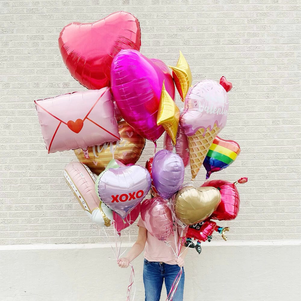 Huge helium mylar bundle of Valentine’s Day balloons from Just Peachy in Little Rock, Arkansas.